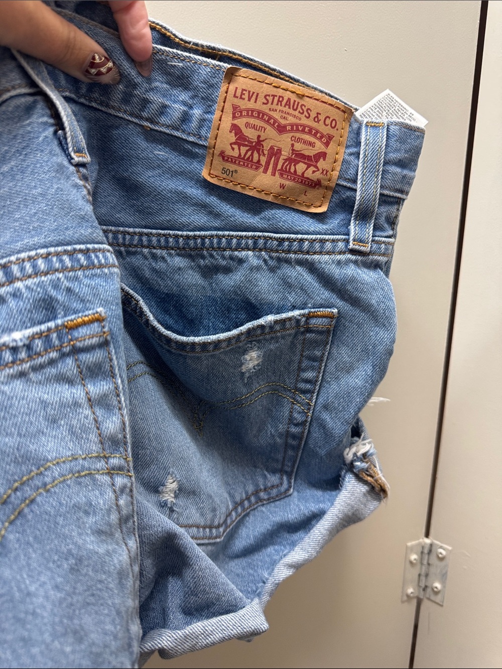 Levi's Light Blue Distressed Cutoff Denim Shorts - Picture 2 of 5